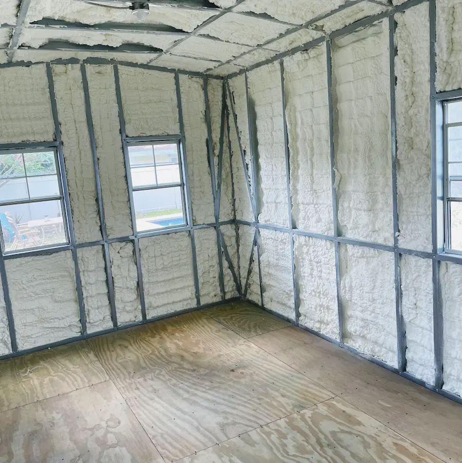 Closed-cell spray foam insulation applied to wall cavities in a residential project in Centerville
